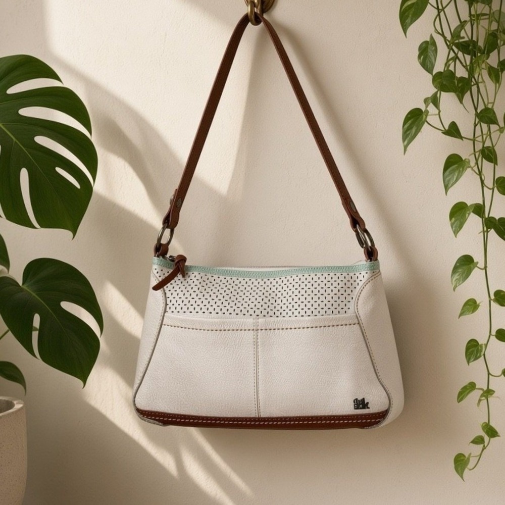 The Sak White Pebbled Leather Shoulder Bag Brown Trim Perforated Detail